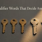 A row of near-identical keys with one different key in focus, illustrating qualifier words that decide exam answers.